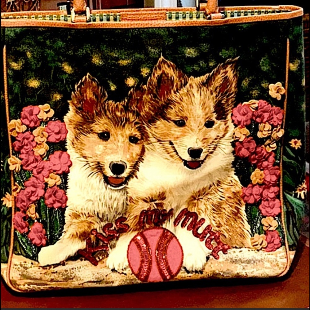 ISABELLA FIORE ALMOST NEW BAG WITH PRECIOUS PUPPY DOGS ON FRONT.